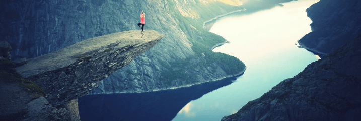 Cooling yoga poses on a cliff