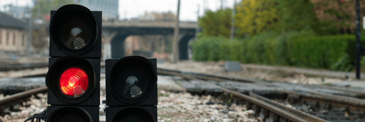 stop light on railroad tracks