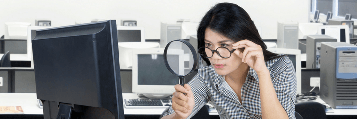 woman with magnifying glass