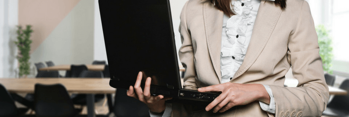 woman holding computer