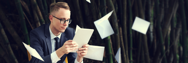 man with papers