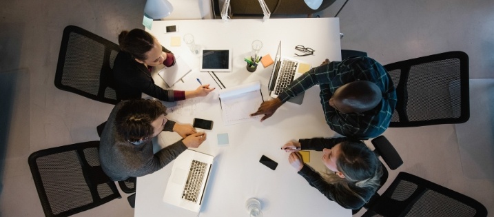 people working at a desk